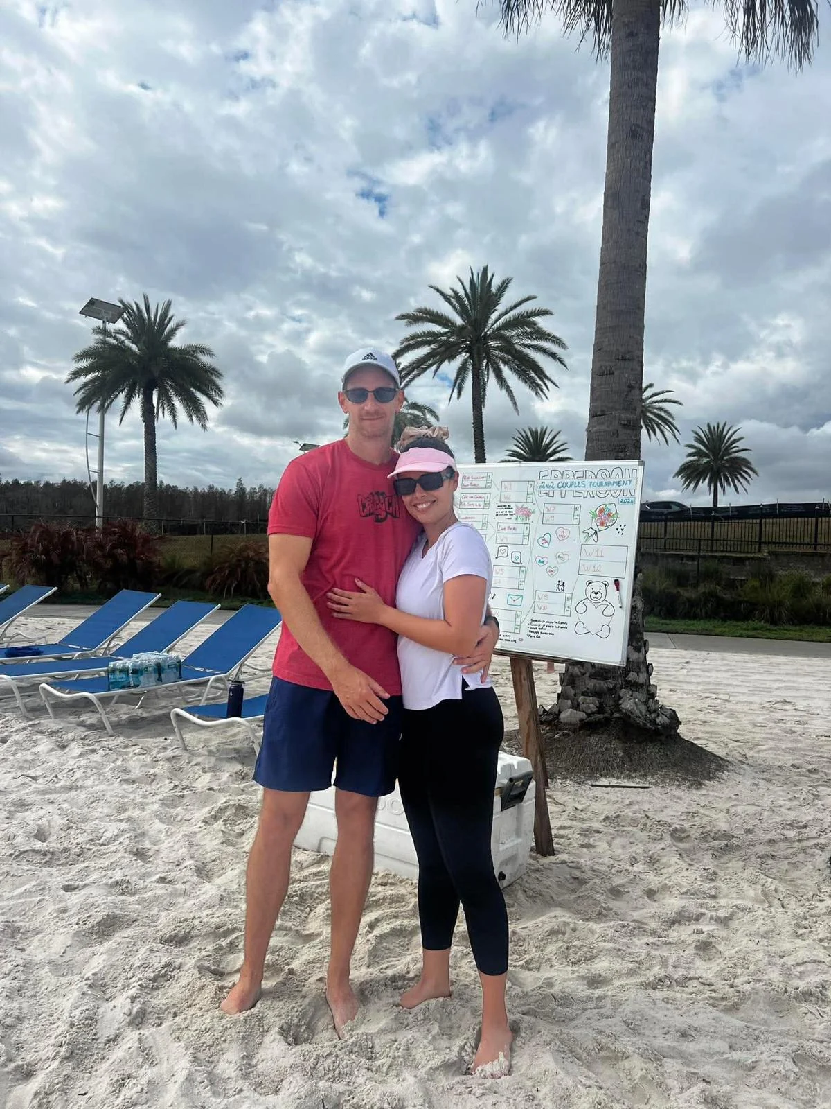 Rob and Veronica on the sand at a beach volleyball tournament